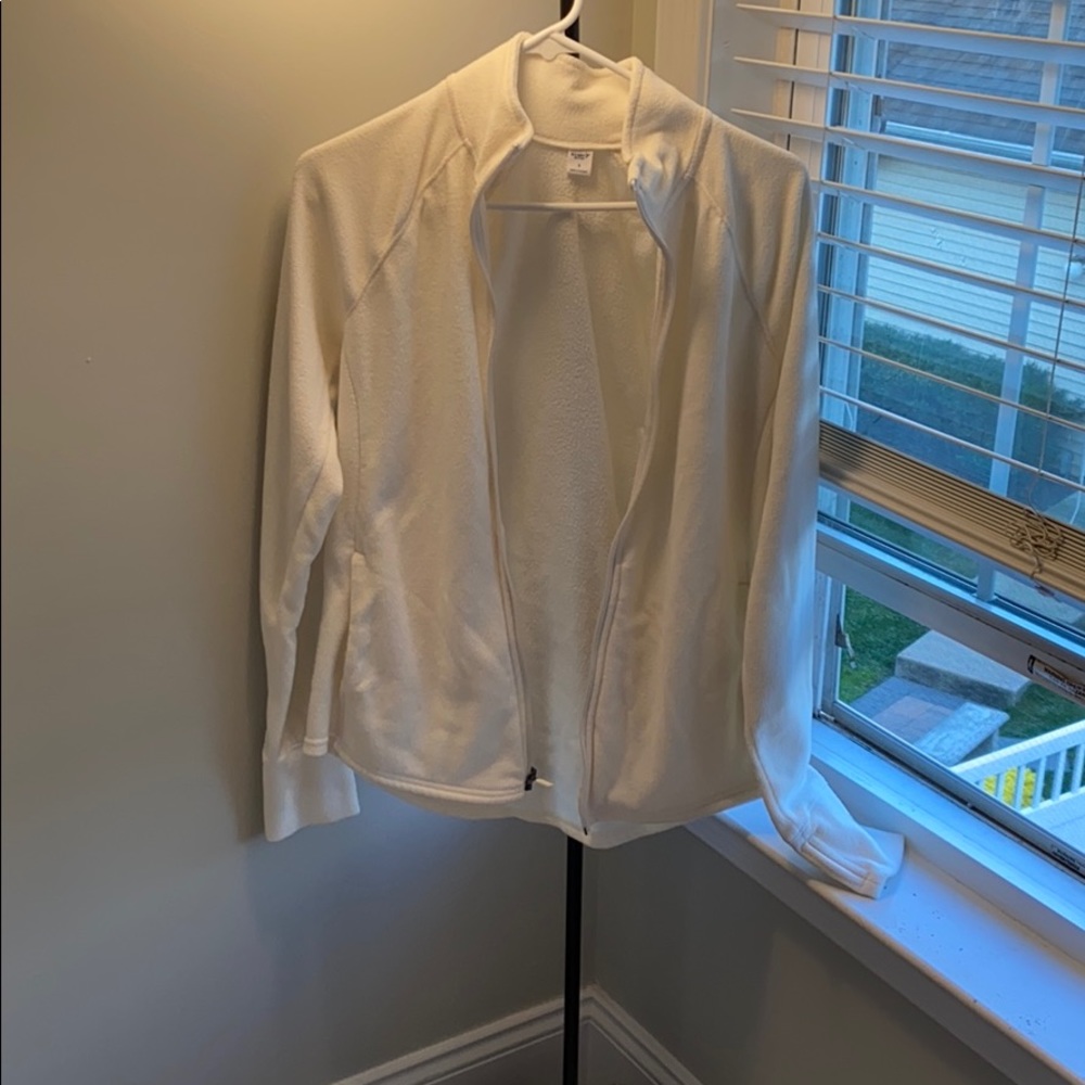 cream colored zip up sweatshirt